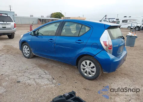 2014 Toyota Prius C One from USA, damaged, VIN JTDKDTB39E1083614